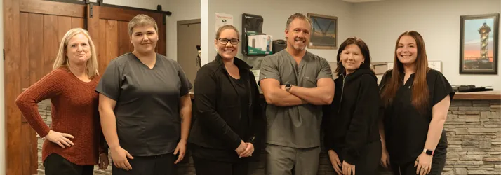 Chiropractor Erie PA Thomas Perkins With Team Contact Us